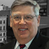 Raymond J Dague